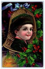 c1910's Christmas Giant Bell Boy Holly Berries Embossed Junction KS Postcard picture