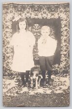 Postcard RPPC Photo Children Boy & Girl w Loyal Dog Puppy Rug Antique Unposted picture