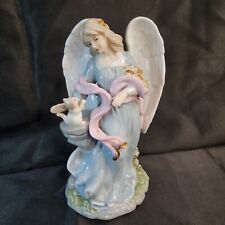 Angel With Kitten Musical Figurine Plays Joy To The World picture