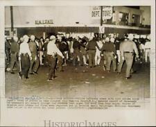 1964 Press Photo Policemen drive back a crowd of youths at Hampton Beach, N.H. picture