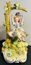 Vintage Capodimonte Italian Porcelain Figurine, Boy Pushing Girl on a Swing picture