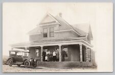 RPPC Family on Porch with Car c1920  Real Photo Postcard picture