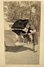 1941 CHEVROLET FLEETLINE four-door Sedan ? & lady.  B&W photo, 4 5/8