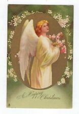 1906 Tuck's Christmas Postcard Series #7752 Angel Holding Pink Flowers Posted picture