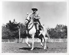 The Lone Ranger Clayton Moore smiling as he rides Silver 8x10 inch photo picture