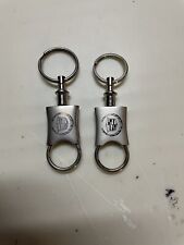 Two Metal Cadillac Keychains. (2) Rings To Put Keys & One Is Detachable On Each picture