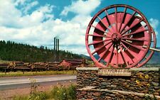 Giant Logging Wheels At Western Entrance To Flagstaff Arizona Postcard picture