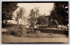 RPPC Woman and Man We just Planted A New Tree Take a Photo Postcard I22 picture