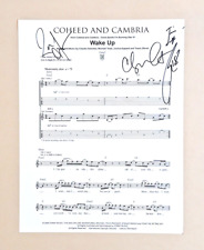 COHEED and CAMBRIA SIGNED 8.5x11 SHEET MUSIC PAGE claudio +3 good apollo COA picture