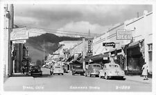 J68/ Yreka California Postcard RPPC c40-50s Main Street Stores Autos 165 picture