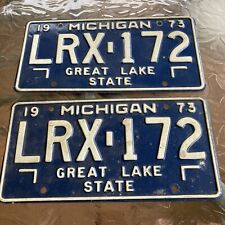 1973 Michigan License Plate PAIR / Matching SET  LRX-172 White on Dark Blue picture