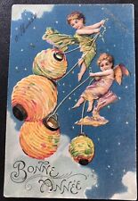 Flying Cherubs Wings Swinging Lanterns New Years Embossed Vintage Postcard W24 picture