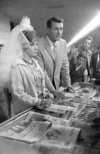 Gina Lollobrigida and American actor Rock Hudson at a news stand i- Old Photo picture