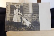 Antique Cabinet Card/Postcard. Seven Year Old Girl w/doll in Carriage picture