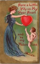 1910 VALENTINE'S DAY Greetings Postcard Cupid Trying to Kick Pretty Lady's Heart picture