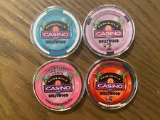 Lot of 4 Chips from Seminole Casino in Hollywood, FL - $1, $2, $2.50, $5 picture