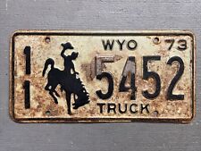 VINTAGE 1973 WYOMING LICENSE PLATE BUCKING BRONCO WHITE/BLACK 11-5452 TRUCK 🤠 picture