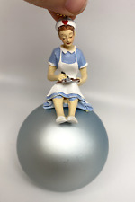 Nurse Sitting on Bulb Bauble Christmas Ornament picture
