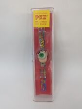 PEZ -  LCD Watch Psychedelic Green Eye Black Hand Mint in Original Case. picture