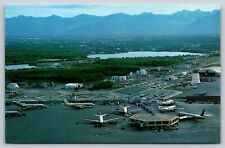 International Airport Anchorage Alaska Crossroads Of The World Postcard Airplane picture