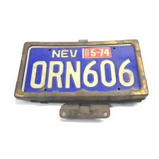VINTAGE 1970's NEVADA LICENSE PLATE W/ PLATE FRAME & MOUNT 1974 TAG USED VINTAGE picture