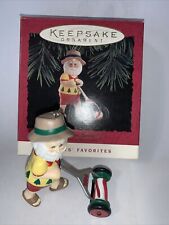 Hallmark Keepsake Ornament 1994 Keep on Mowin' Santa & Old-fashioned Lawn Mower picture