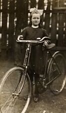 Antique 1920 RPPC Cute Girl Triumph? Bicycle T.I.C. Real Photo Postcard Vtg picture