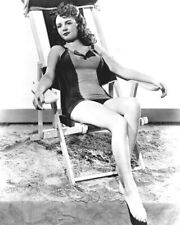 Betty Field 1940's leggy pose in swimsuit sitting in beach chair 11x17 poster picture