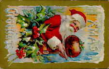 Postcard: Santa Holding Plate Xmas Greetings c.1910 picture