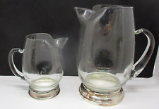 2 Vintage Clear Glass Pitchers with Silverplate Bases picture