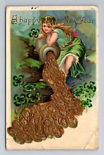 A Happy New Year Pouring Coins Four Leaf Clovers Embossed Vintage c1906 Postcard picture