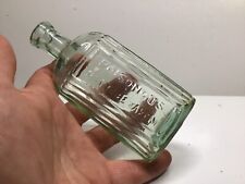Small Squatty Antique Poisonous Embossed Oval Not To Be Taken Poison Bottle. picture
