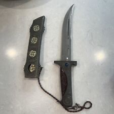 Asian Design Looking Knife In A Scabbard picture