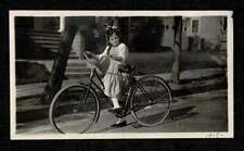 1919 YOUNG LADY HAIR BOW IN STREET BICYCLE OLD/VINTAGE PHOTO SNAPSHOT- J140 picture