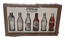 Coca Cola Wood Framed Evolution of the Bottle Picture NWT picture
