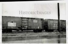 1971 Press Photo Signs painted on boxcar at yard in La Salle, Illinois picture