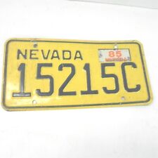 VINTAGE NEVADA LICENSE PLATE 15215C TAGGED IN 1985 COLLECTIBLE YELLOW & BLUE picture