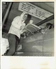 1968 Press Photo Car-Hopper Gail Aho at Eau Gallie Drive-In During Cold Weather picture