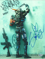 SHARLTO COPLEY SIGNED 11X14 PHOTO CHAPPIE DISTRICT BECKETT BAS AUTOGRAPH AUTO A picture