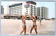 1970's REHOBOTH BEACH DELAWARE HENLOPEN HOTEL BIKINI GIRLS PLAYING BALL POSTCARD picture