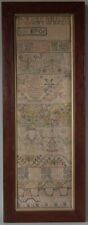 17TH CENTURY ENGLISH NEEDLEWORK MOTIFS ON A 1705 SAMPLER picture