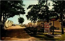 1960'S. EAST TAWAS, MICHIGAN. NORTHLAND BEACH CABINS. POSTCARD xz11 picture