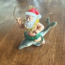 Santa Claus Riding a Dolphin Hawaiian Christmas Ornament picture