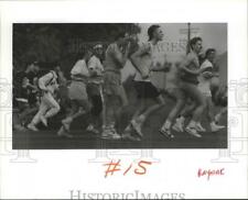 1991 Press Photo Bloomsday runners, tired and sweaty,by reaching Broadway Avenue picture