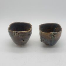 2 wood fired unglazed clay sculpture handmade teacups picture