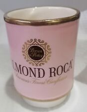Vintage Almond Roca 1979 Fred Haley coffee mug pink with gold trim 3.75 tall  picture
