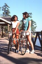 Original 35mm Kodachrome Slide Pretty Woman & Handsome Man On Bicycles 1978 picture