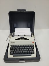Vintage Olympia International De Luxe Typewriter - White with Case picture