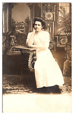 RPPC Sitting Pretty Lady, Beautiful Painted Studio Background Postcard picture