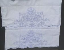 white cotton standard pillowcases w/pale blue embroidery, vintage picture
